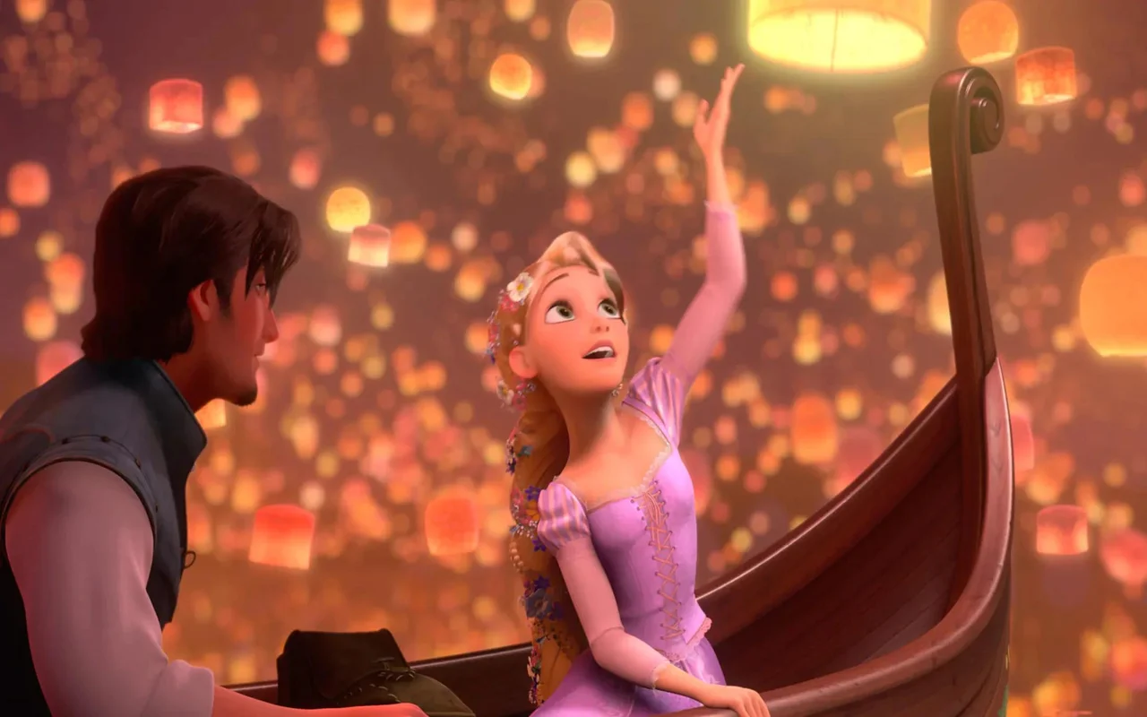Rapunzel with braided hair, holding a hand up towards the sky - A scene from Tangled (2010)